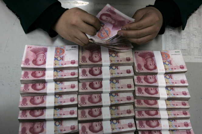 Trung Quốc phá giá đồng NDT, dẫn tới những lo ngại về nền kinh tế nước này - Ảnh: Reuters