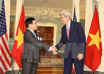 Phó Thủ tướng, Bộ trưởng Ngoại giao Phạm Bình Minh và Ngoại trưởng Mỹ John Kerry tại cuộc hội đàm hôm qua. Ảnh: TTXVN