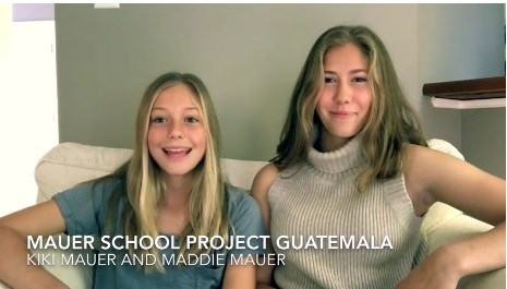 Hai chị em Kiki và Maddie trong một đoạn video kêu gọi mọi người hỗ trợ cho dự án xây trường ở miền núi  /// Ảnh chụp từ video Facebook/ Mauer School Project: Guatemala