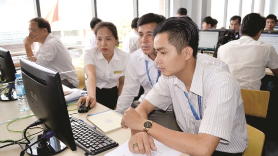 Các trường tham gia chạy thử phần mềm xét tuyển chung do Bộ GD-ĐT tập huấn ngày 13-6 tại Trường ĐH Nguyễn Tất Thành