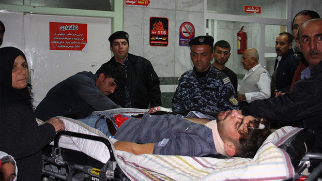 Một nạn nhân đang được chữa trị tại bệnh viện Sulaimaniyah vào ngày 12.11 tại Iraq /// AFP