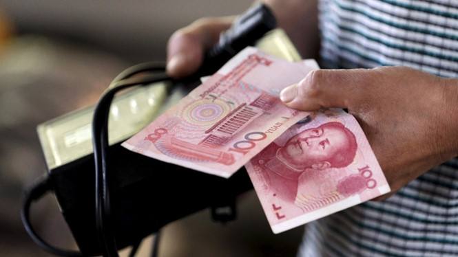 CNY đã có mặt trong rổ tiền tệ quốc tế của Quỹ Tiền tệ quốc tế (IMF) từ vài năm qua /// Reuters
