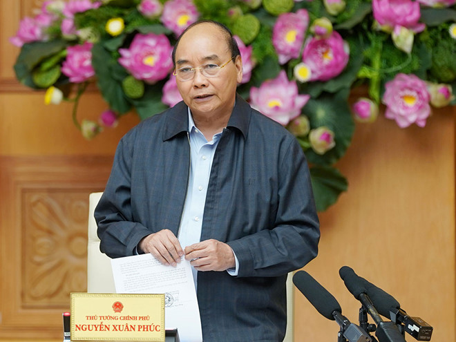 Thủ tướng Nguyễn Xuân Phúc chủ trì cuộc họp chiều 24.2  /// Ảnh: Quang Hiếu