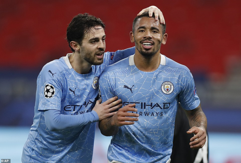Manchester City goalscorers Bernardo Silva and Gabriel Jesus celebrate during Wednesday nights win in Budapest