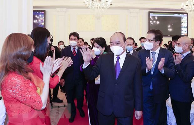 Chủ tịch nước Nguyễn Xuân Phúc gặp mặt đại diện kiều bào Việt Nam tại Liên bang Nga ảnh 1